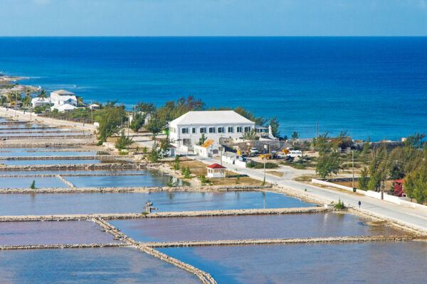 Aerial photo of the colonial Harriett White House and salt salinas on Salt Cay