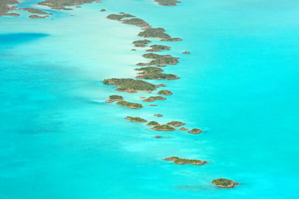 Aerial view of small limestone islands in the Chalk Sound National Park