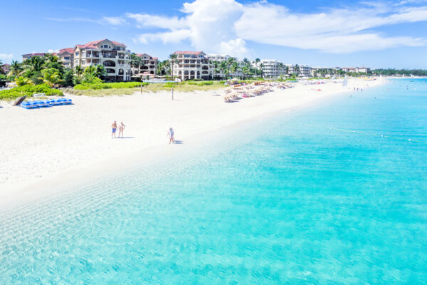 Calm ocean water and white sand at Grace Bay Beach