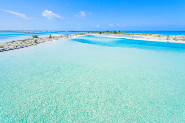 Aerial photo of clear ocean water at Half Moon Bay lagoon