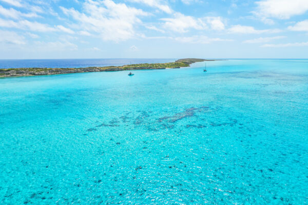 Aerial view of two sailboats anchored near Long Cay