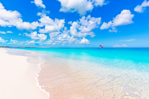 Grace Bay Beach with parasail on the horizon