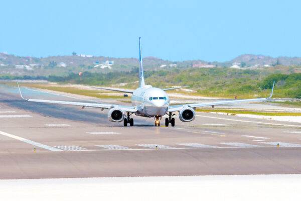 Jet Blue airliner on the runway at the Providenciales International Airport