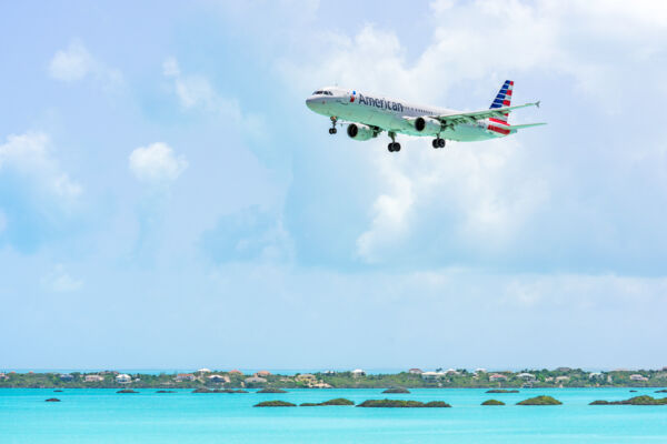 Airplane approaching the PLS Airport over Chalk Sound National Park