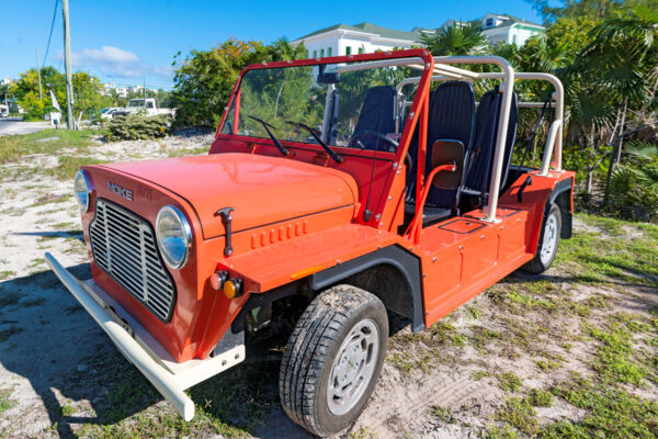 Red rental Mini Moke in Grace Bay