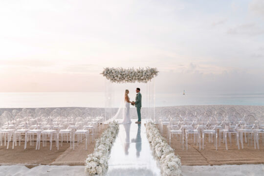 Beach wedding at sunset in Turks and Caicos.