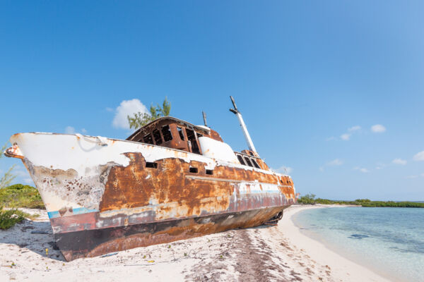 Fishing boat hulk at Bermudian Harbour Bay on Providenciales