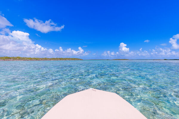 Boat charter in clear water near Middle Caicos in the Turks and Caicos.