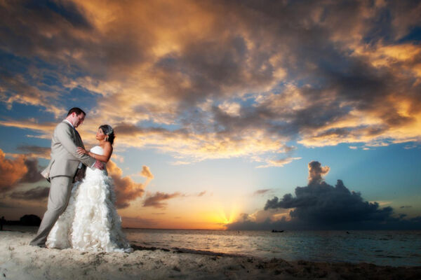 Sunset photo on Grace Bay Beach with bride and groom