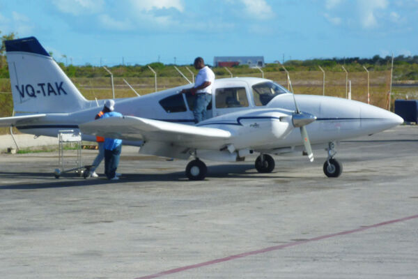 Caicos Express Piper Aztec on the tarmac at the Providenciales International Airport