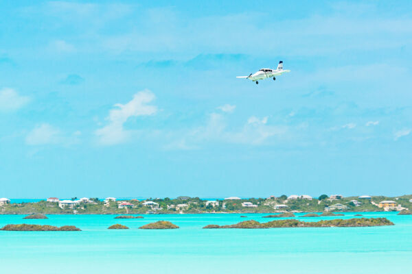 Piper Aztec over Chalk Sound National Park