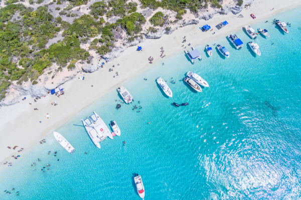 Aerial view of a boat party at Water Cay in the Turks and Caicos