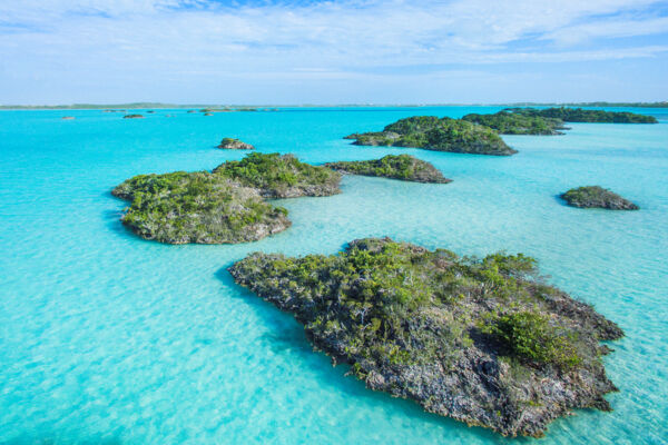 The small limestone islands and turquoise water of Chalk Sound