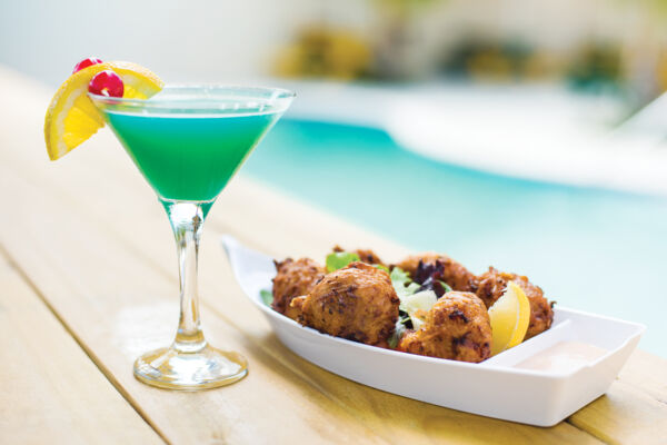 Conch fritters and cocktail at Coconut Grove Restaurant