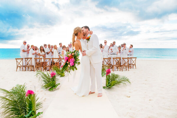 Couple walking down the aisle at a beach wedding in Turks and Caicos.