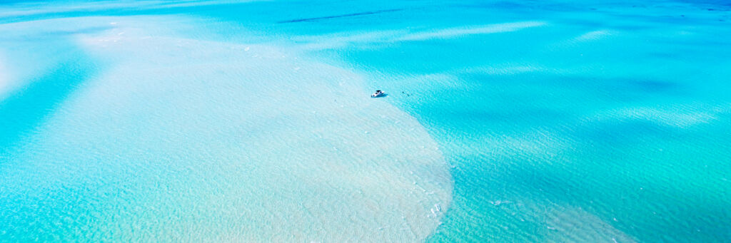 Aerial view of boat at Sandy Point Beach