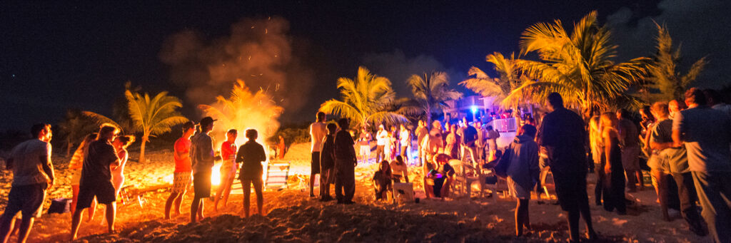 Beach bonfire party at Long Bay Beach