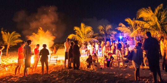 Beach bonfire party at Long Bay Beach