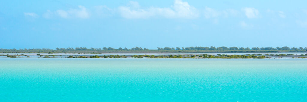 Incredible turquoise water and Bay Cay at Bottle Creek Lagoon 