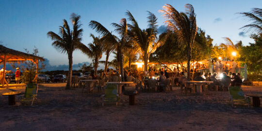 Bugaloo's Restaurant on the beach at Five Cays at dusk