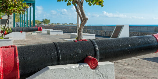 Cannon overlooking Front Street at Cockburn Town