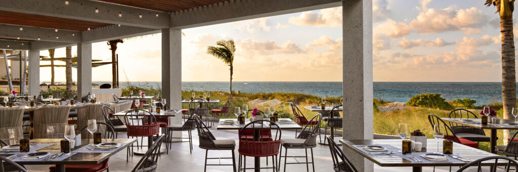 Terrace seating at Casa Nonna restaurant at sunset