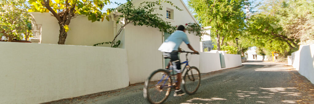 Cyclist late in the afternoon in Cockburn Town