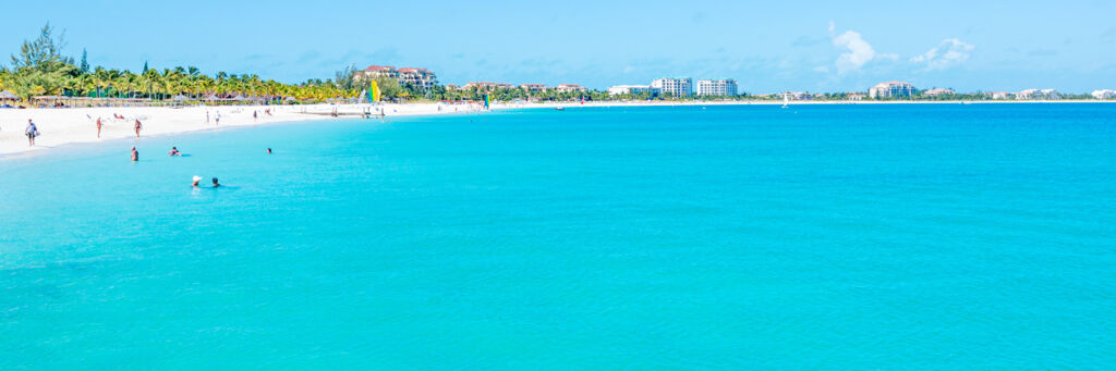 Swimmers in the calm waters of Grace Bay Beach