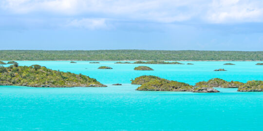 The turquoise water and small islands of Chalk Sound National Park
