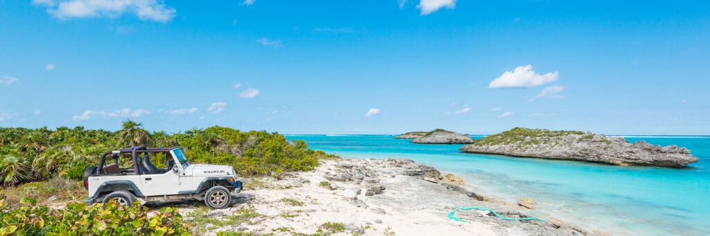 Jeep Wrangler at the coast at Three Marys Cays on North Caicos