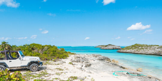 Jeep Wrangler at the coast at Three Marys Cays on North Caicos