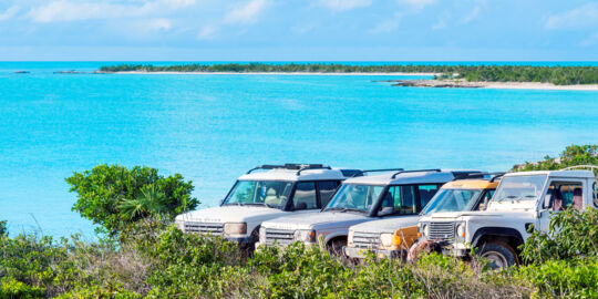 Land Rover Defender and Discovery 4x4s at West Harbour Bluff on Providenciales, Turks and Caicos