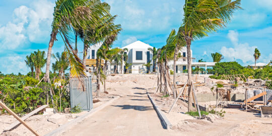 Luxury beachfront mansion under construction at Long Bay Beach in the Turks and Caicos