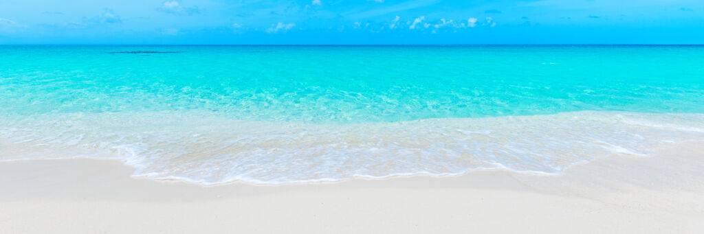White sand and turquoise ocean at North Bay Beach