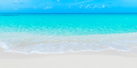 White sand and turquoise ocean at North Bay Beach