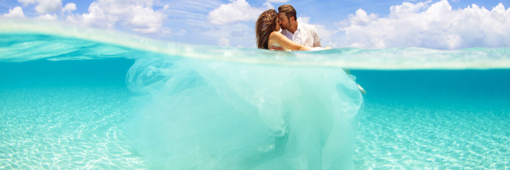 Overunder photo of bride and groom at Grace Bay