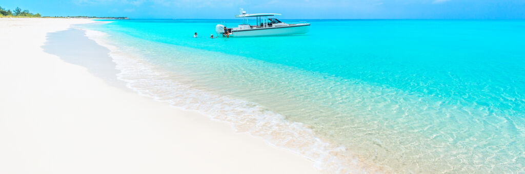 Private yacht charter at Half Moon Bay Beach in Turks and Caicos