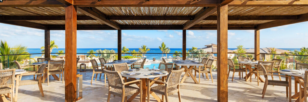 View overlooking the beach from a restaurant terrace.