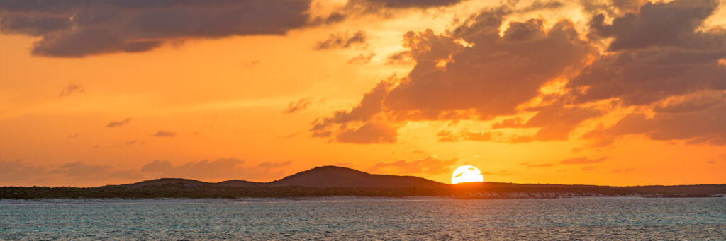 Sunset over Flamingo Hill on East Caicos as seen from Breezy Point