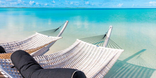 Hammocks at the tranquil lagoon beach at Sailrock 