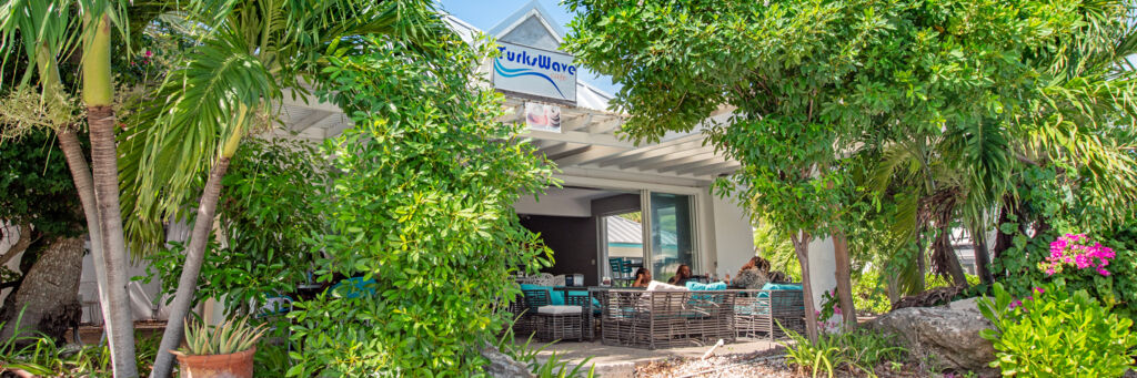 Open-air café with lush landscaping in Turks and Caicos.