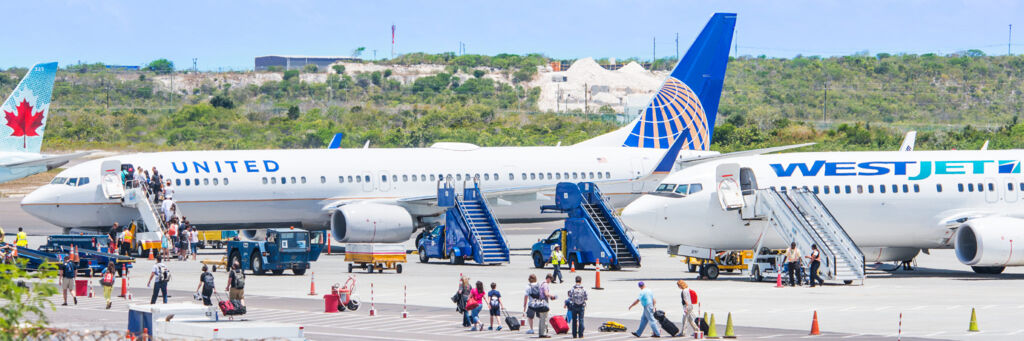 Passengers boarding aircraft at the Providenciales International Airport