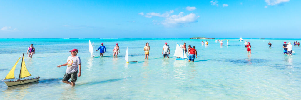 Competitors at the Valentine's Day Cup model sailboat race on Middle Caicos