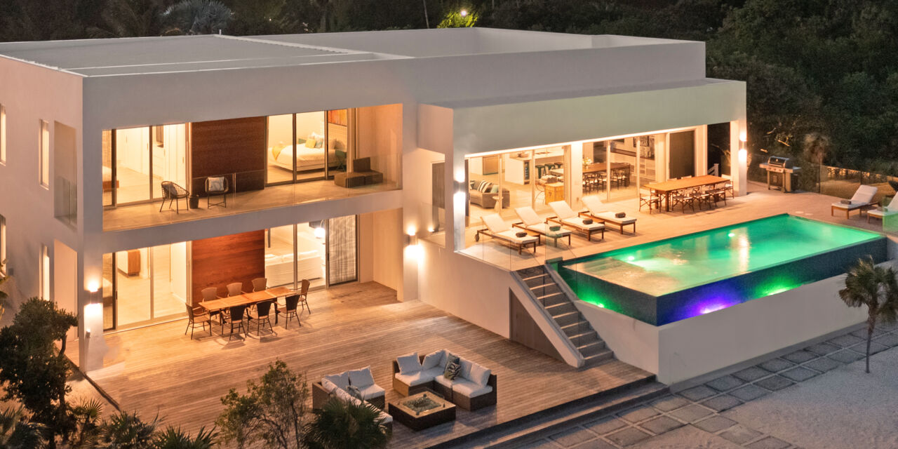 Aerial view of luxury villa in the Turks and Caicos at dusk