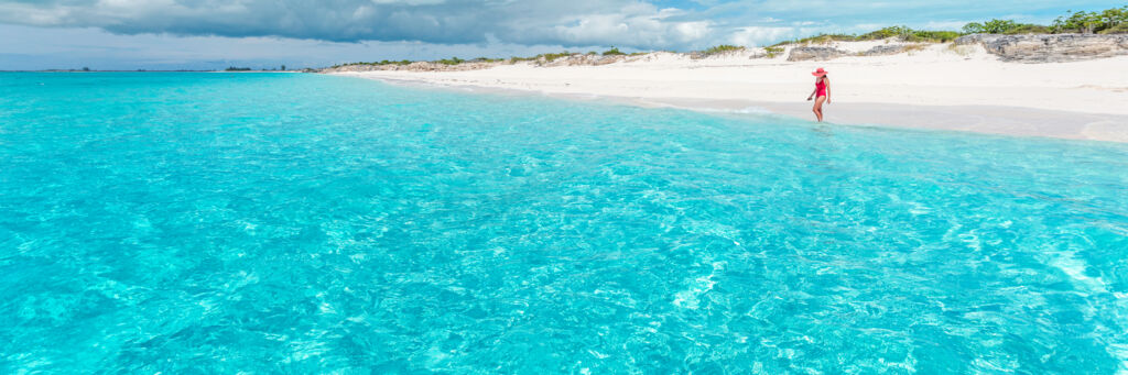 Person standing on the beach at Water Cay in the Turks and Caicos