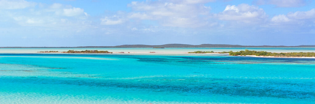 The incredible blue, turquoise and green water hues of Plandon Cay Cut in the Turks and Caicos