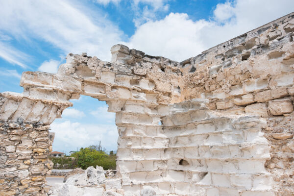 Eroded limestone block wall at a colonial warehouse in Cockburn Harbour on South Caicos 