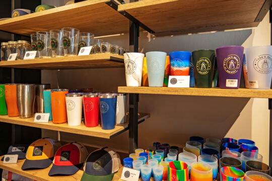 Shelf of branded cups Turk's Head Brewery. 