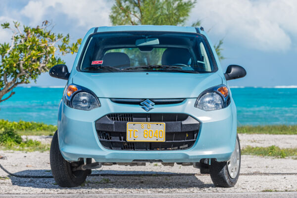 Blue economy rental car at the coast in Blue Hills on Providenciales