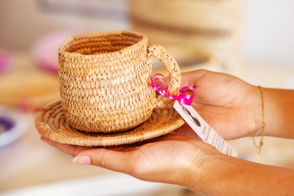 Straw teacup and plate made in the Turks and Caicos.